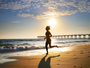 girl_running_on_beach-300x225